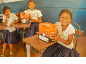 Students recieving solar reading lights courtesy of donations to Ometepe Sustainability Group